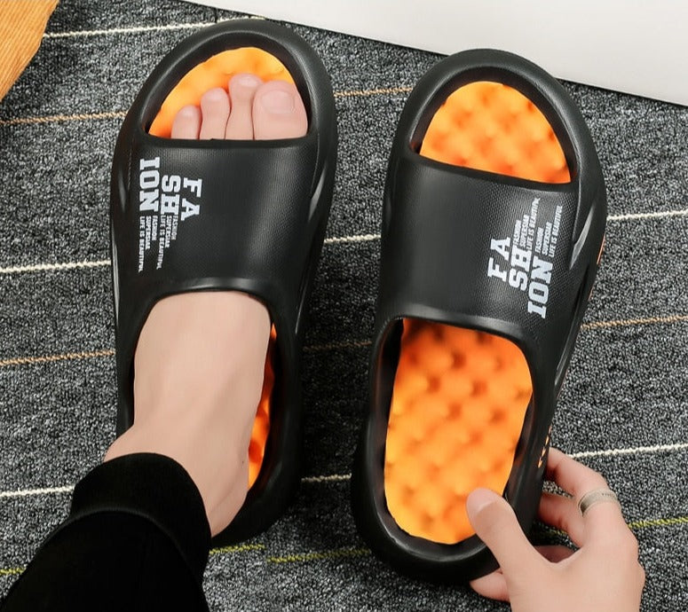 Schwarze Badeschlappen mit orangefarbener Sohle, modisch, bequem, rutschfest, Unisex.