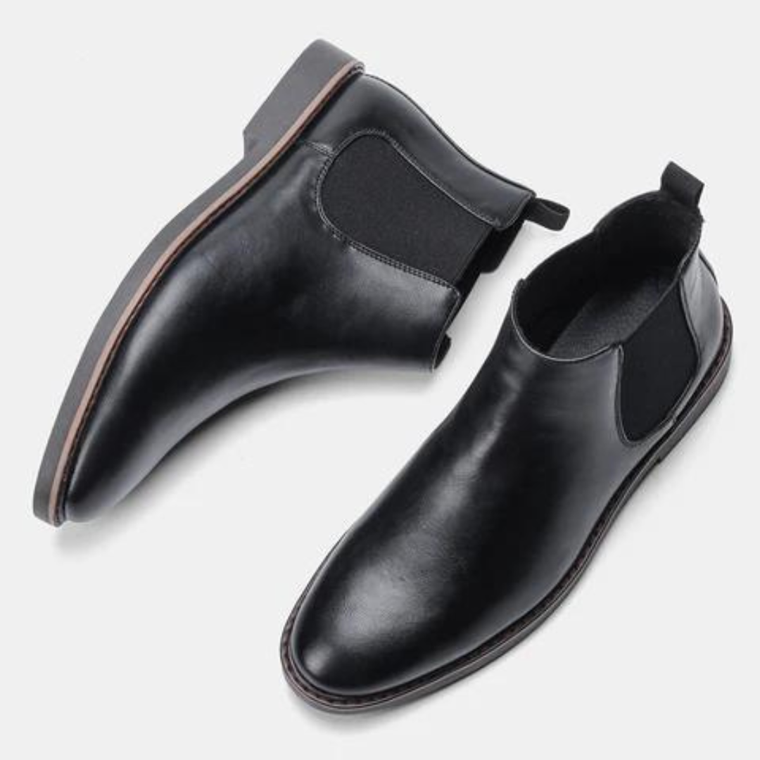 Schwarze Chelsea Boots aus Leder, elegante Herrenschuhe, rutschfeste Sohle, modisch und bequem.