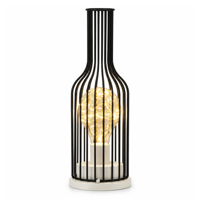 Trådlampa formad som en smal flaska med svart stomme, vit sockel och lysande glödlampa 3