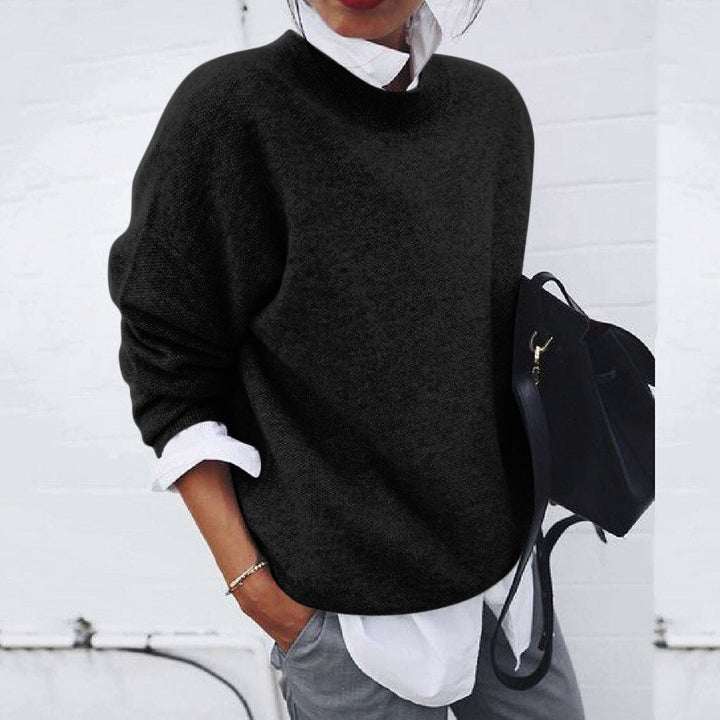 Damenpullover schwarz, lässig, Strick, Herbstmode, übergroß, eleganter Stil, Freizeitkleidung.