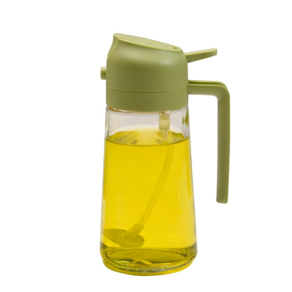 Grüner Ölspender aus Glas mit Griff, ideal für Küche, Essig oder Öl, modernes Design.