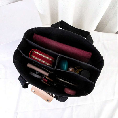 Schwarzer Filz-Taschenorganizer mit Fächern, ideal für Handtaschen, Kosmetik und Accessoires.
