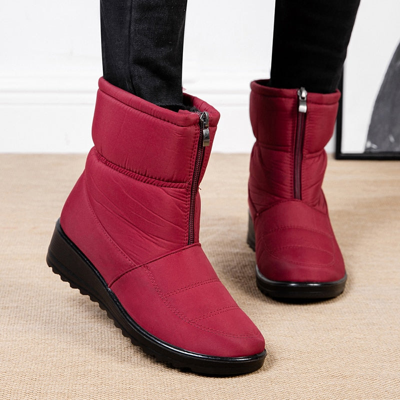 Rote Damen-Winterstiefel mit Reißverschluss, rutschfeste Sohle, warm gefüttert, modisch.