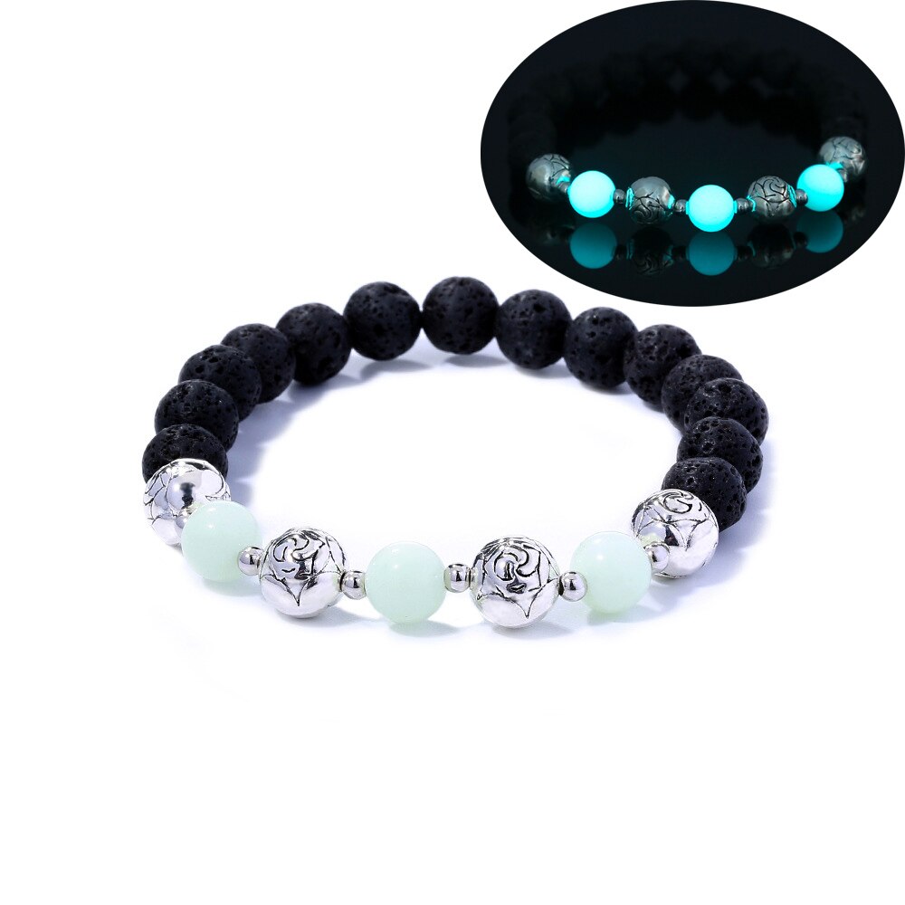 Schwarzes Lavastein-Armband mit leuchtenden Perlen und silbernen Akzenten, Unisex-Schmuck.