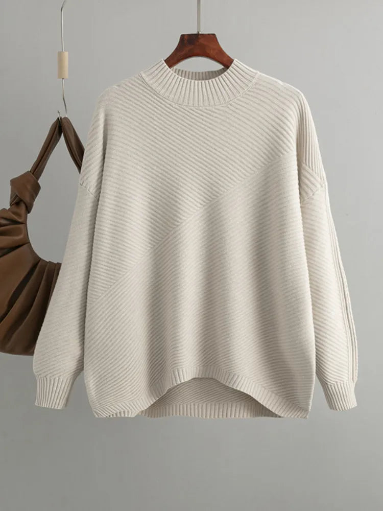Beiger Strickpullover Damen, gerippt, oversized, Herbstmode, gemütlich, warm, elegant.