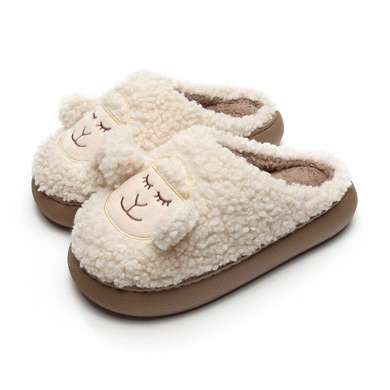 Beige Hausschuhe aus Plüsch mit Schafmotiv, rutschfeste Sohle, gemütliche Damen-Pantoffeln.