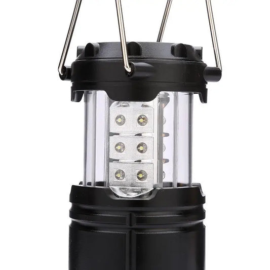 Schwarze LED-Campinglaterne, tragbar, batteriebetrieben, Outdoor-Beleuchtung.